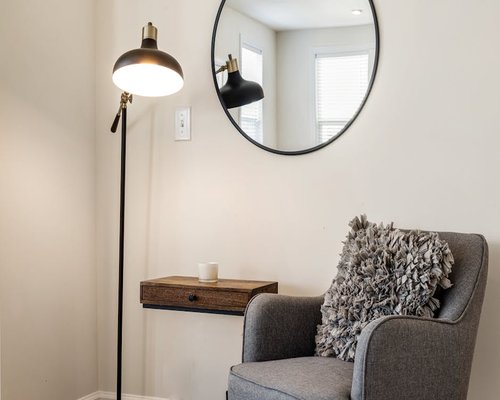 Cozy reading corner with an armchair and a floor lamp